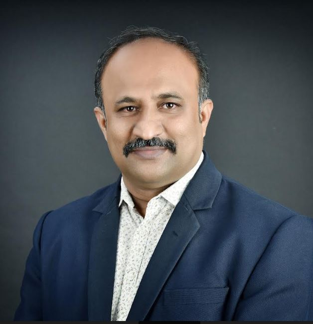 Portrait of Dr. MGS Prasad, Consultant Periodontist · Implantologist
